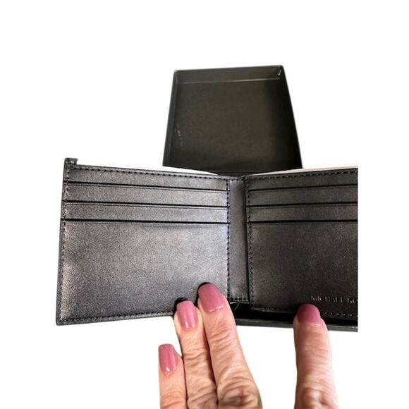 NWT Michael Kor Slim Billfold. Black with Michael Kor emblem on front & back. - Picture 3 of 6
